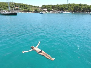 Floating crew in idyllic water