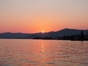 Flight leaving Split airport at sunset